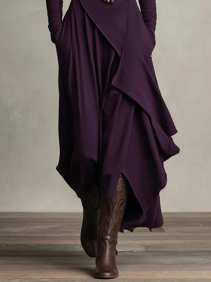 Vestido largo plisado asimétrico con cuello alto