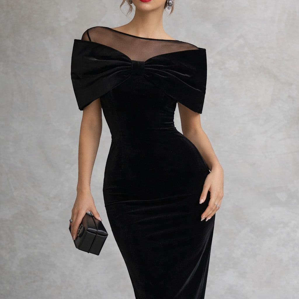Vestido midi de terciopelo negro dramático con lazo