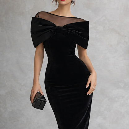 Vestido midi de terciopelo negro dramático con lazo
