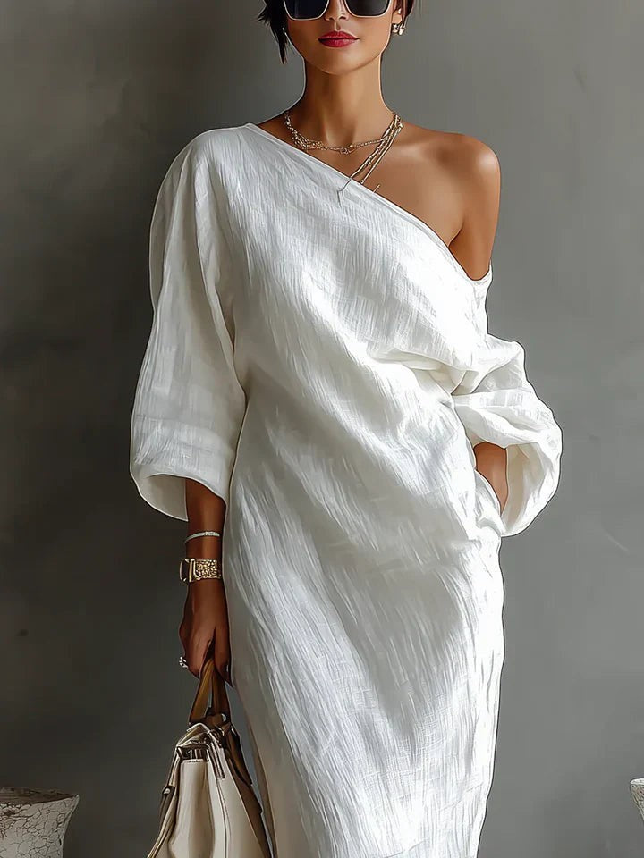 Vestido largo elegante y fluido con un solo hombro