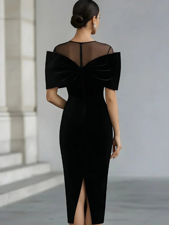 Vestido midi de terciopelo negro dramático con lazo