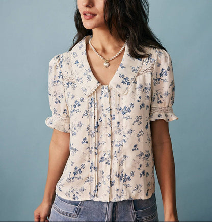 Cira - Camisa floral plisada con detalles de encaje