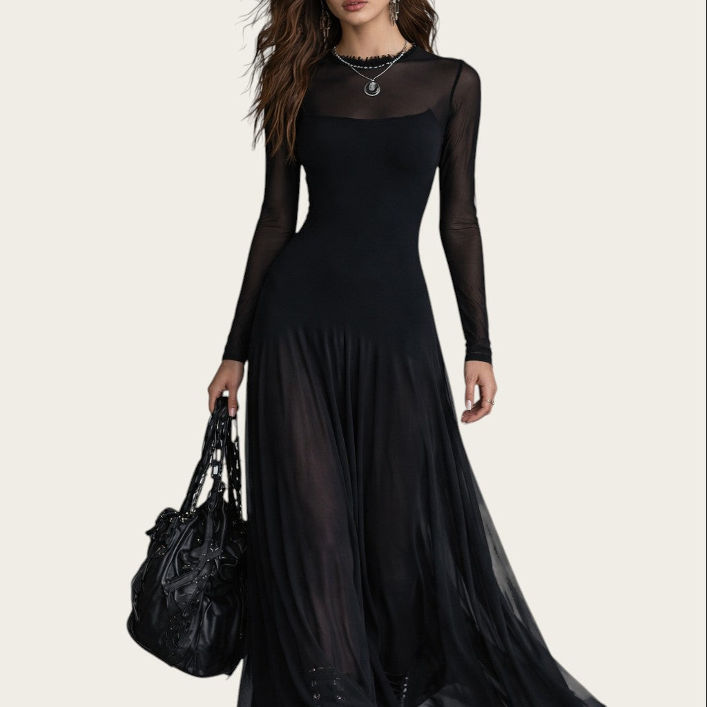 Vestido largo negro Sofi de Victoria Lemaire con mangas transparentes y falda de tul, estilo vintage.