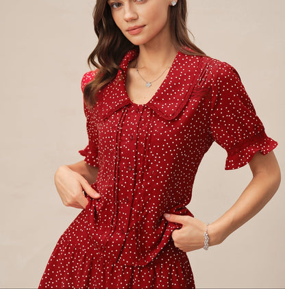Alba - Vestido rojo con mangas abullonadas y cuello de lunares